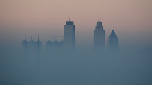City In Smog by katushang(Thanks for 3 million views!), Air Pollution made the wierdness possible.china city sunset urban building heilongjiang skyline niko
