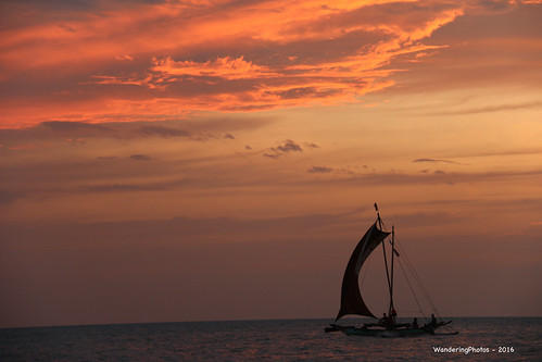 Sunset with traditional boat - Negombo Sri Lanka by WanderingPJB, srilanka negombo traditionalboat sail orange cloud colourfulworld img cmwdorange bw