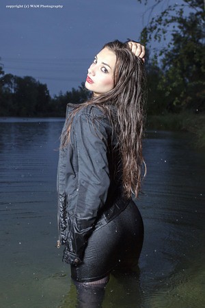Mili escapes the rain into the lake - a photo on Flickriver