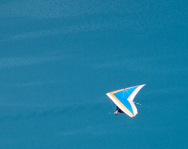 Hang glider over lake Annecy, France