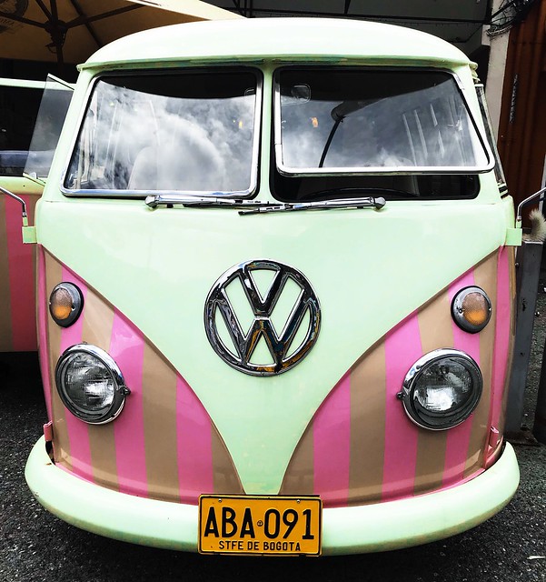 A single and unique pink Volkswagen Van