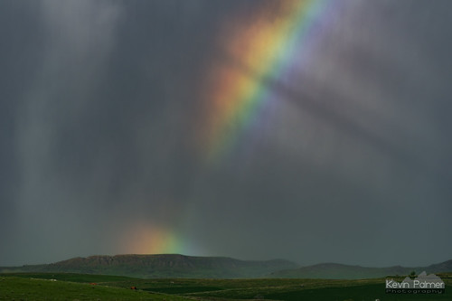 sheridan wyoming rain weather thunderstorm storm stormy sky clouds evening spring may hail nikon180mmf28 telephoto rainbow bow colorful color green hills nikond750