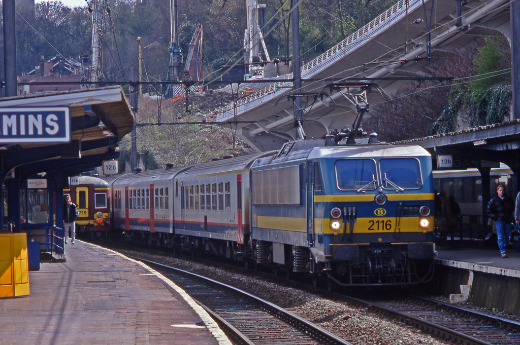 With preliminary works for the new Liege Guillimins station visible behind, SNCB 2116 arrives at platform 13B with a Verviers Centraal-Brussels service. 18April2001