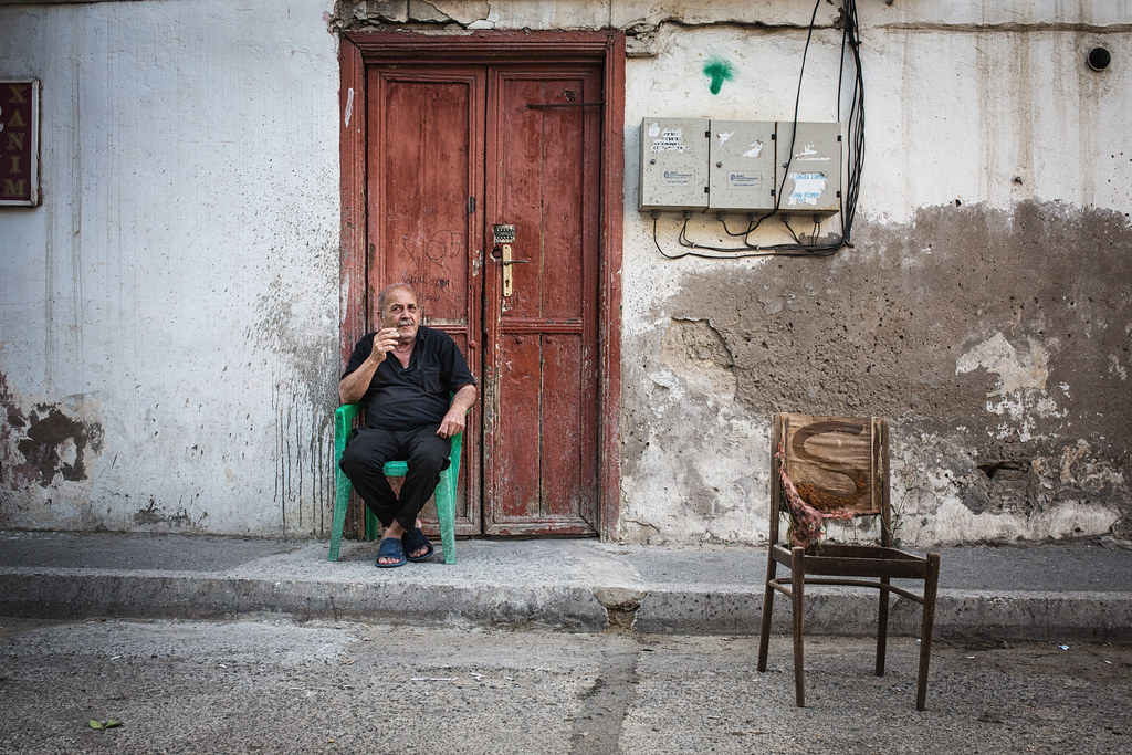 Man smoking and chair, Baku