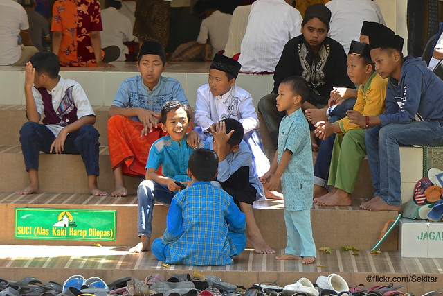 Boys during friday prayer, great Mosque - Mesjid Jamik, Sumenep, Madura