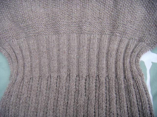 cottontail cardigan. detail of the waist shaping.