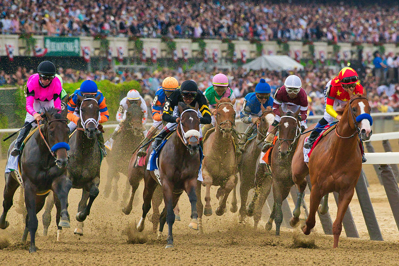 Justify leads the pack on the first turn on his way to the Triple Crown 2