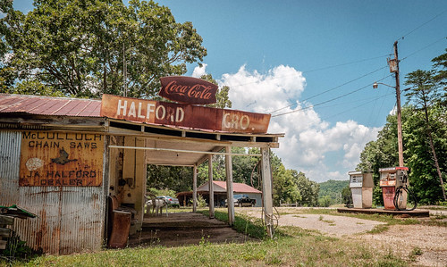 Abandoned Grocery Store with Retro Gas Pumps | Brett Streutker | Flickr