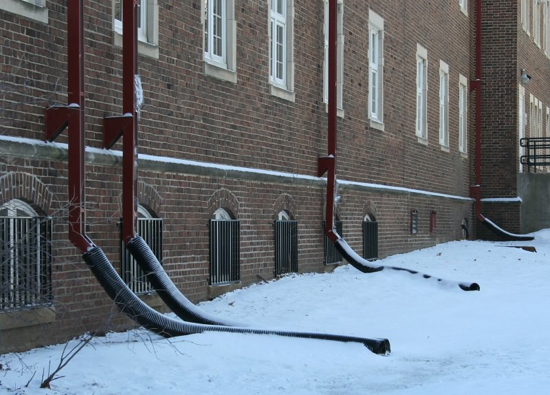 Snakes in the Snow | Frozen downspouts behind a building at … | Flickr