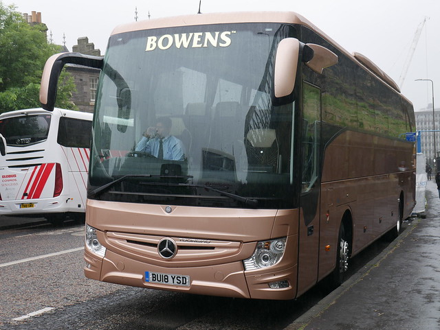 Thandi Coaches of Southall, with Evergreen Coaches legals and Bowens of Halesowen livery, Mercedes Benz Tourismo Base BU18YSD at Johnston Terrace, Edinburgh, on 11 June 2018.