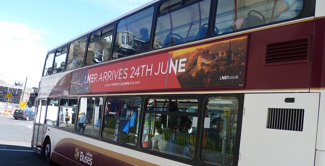 New railway brand advertised on a bus.