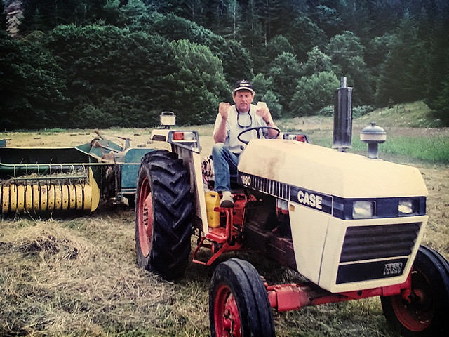 Rick Howard baling hay