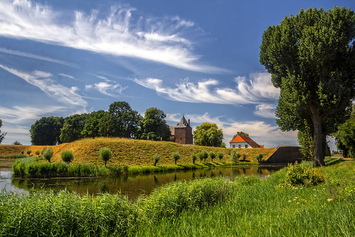 castle loevesteijn netherlands thenetherlands nederland blue bright color colors colours clouds green landscape light monumental outdoors outdoor orange reflection red sony sky sun tree trees view wimvandem water