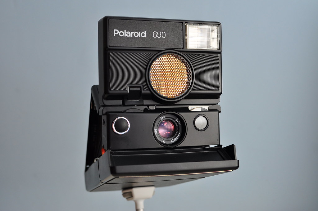 Polaroid 690 | The Polaroid 690 has an 116mm, f8-f90, fully … | Flickr