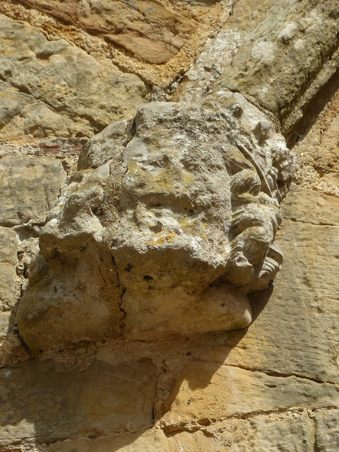 Carved face on gatehouse