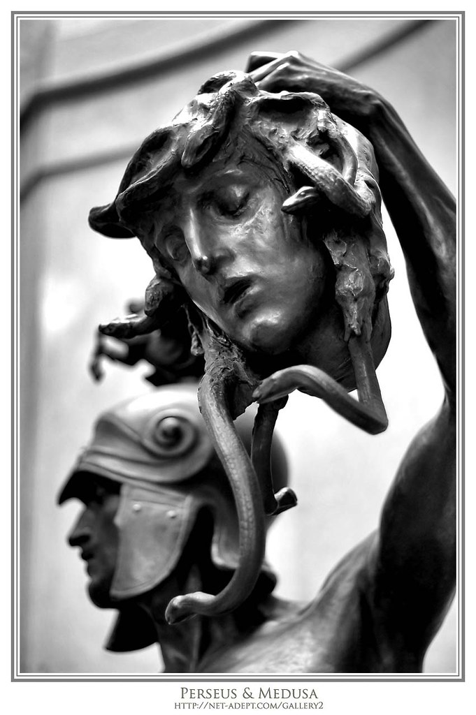 Perseus & Medusa A statue of Perseus holding The Medusa's . 
