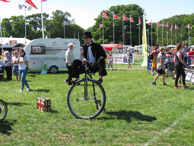 Trick cyclist on a Penny Farthing.