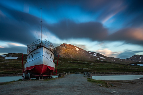 Bitihorn x 2 by Stokkis, Two times Bitihorn. The boat and the mountain behind is called Bitihorn. Both of them has a mast. Th