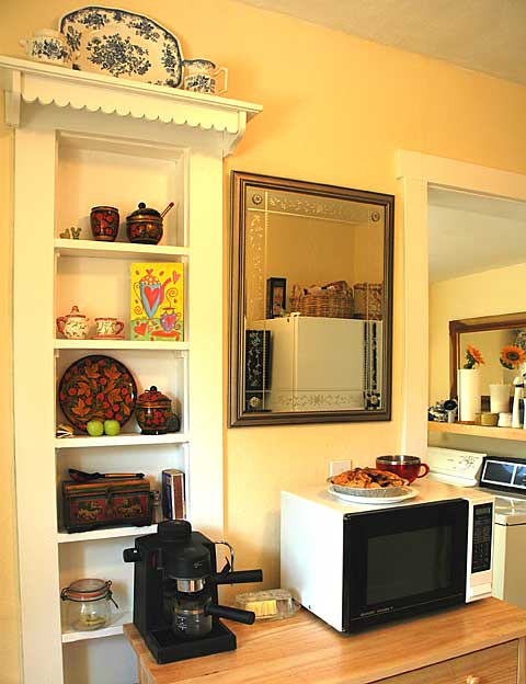 Cooking area, valance, vintage French toile plates, kitchen display, fresh apple pie, espresso coffee maker, mirrors, laundryroom, Seattle, Washington, USA