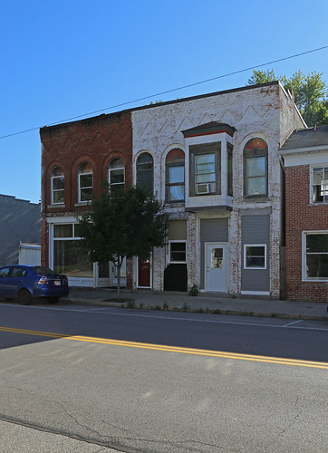 prospect ohio marioncounty building structure historic commercial twostory brick storefronts altered dilapidated corbelling corbelled roundarched windows boxbay