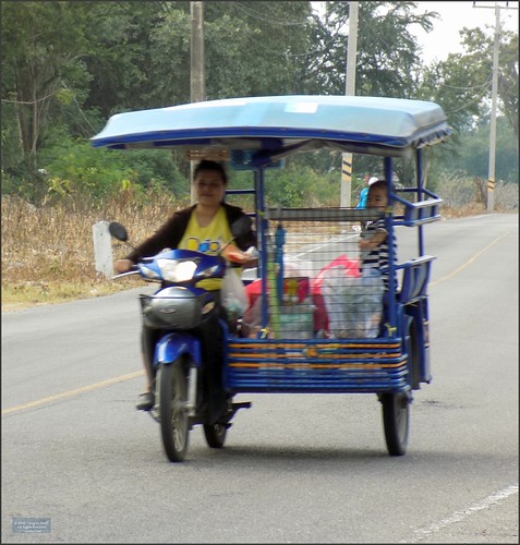 Prachuap Khiri Khan, Ao Manao Taxi 20180122_164544 DSCN1776 by CanadaGood, Samlor GaiNa with driver, cargo and child on roads of Ao Manoa Wing 5 air base.
South of Prachuap K