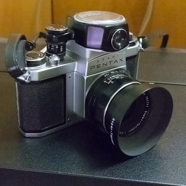 Pentax SV+35/3.5 w/lens hood. The top mounted light meter was acquired later.