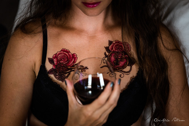Lips, wine and tattoo