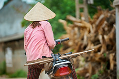 Woman preparing to ride a moto