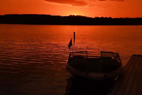 west bend wisconsin sunset at big cedar lake wi robert kramer