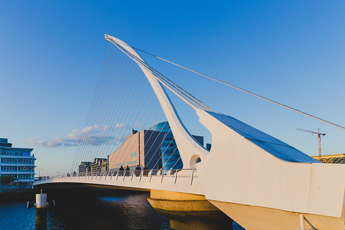 view of Dublin's famous Samuel Beckett Bridge over the river Liffey at blue hour