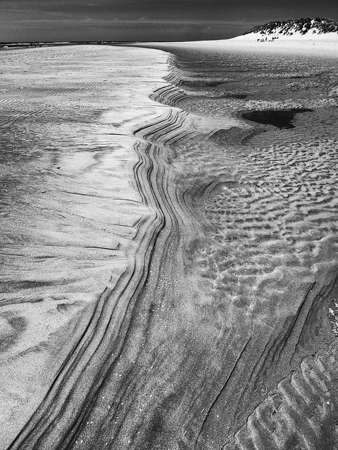 Sand patterns on a Welsh beach ...