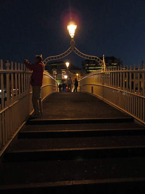 The Ha'penny Bridge at night in Dublin, Ireland