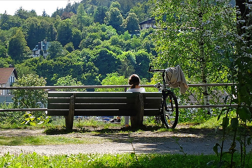 berchtesgadenerland people bench sun shadows bicycle badreichenhall