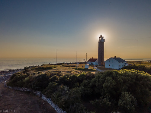 lighthouse trees drone ocean sunset aerials sea vestagder norway no