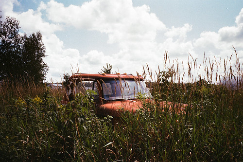 pentax espio 80 80s truck field country abandoned sky blue clouds red green grass tall retro vintage antique hipster old analogue analog picture photo film grain noise 35mm 35 montreal quebec city canada point shoot white cloud photography saint tree leaf leaves richelieu montérégie landscape vallée valley summer