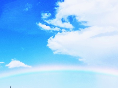 rainbow sky clouds blue