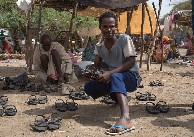 Shoe dealer made from tires, At karrayyu market, Oromia, Metehara, Ethiopia