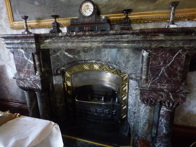 Penrhyn Castle - bedrooms - The Keep Bedrooms - fireplace and clock