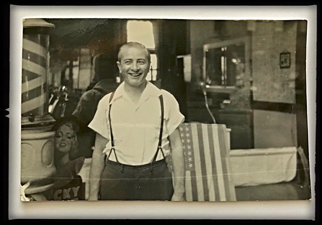 Grandpa Louie > standing in front of his Barbershop