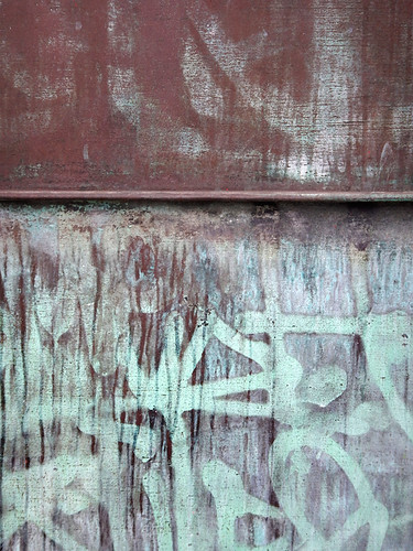 Copper verdigris grafitti on a bridge tower in Copenhagen, Denmark