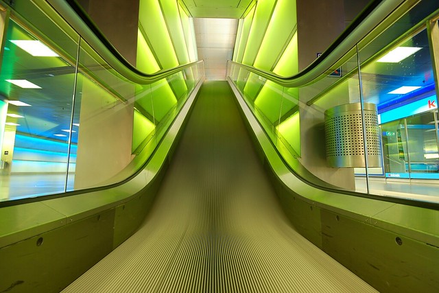 green escalator, blue and a red K
