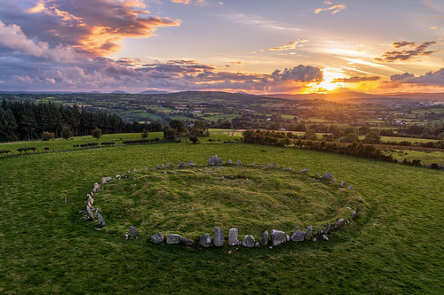 ancient pagan druid druids stone circle standing stones worship monument monuments raphoe county donegal ireland landscape tourist tourism site visit scenic landmark sun set sunset red blue sky summer country side countryside lens gareth wray photography irish eire granite field national trust colourful clear day historic famous attraction photographer pro vacation europe neolithic bronze age outdoor grass dji phantom p4p drone aerial 2018 celtic architecture plant quadcopter four cloudscape