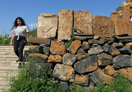 sevenavankmonastery lakesevan armenia caucuses mountain view landscape sevenavank monastery sevan travel composition ancient culture old faith christianity orthodoxchristianity church wall stonewall girl woman pretty cute candid young younggirl beautiful attractive armeniangirl armenianwoman tourism hot armenian