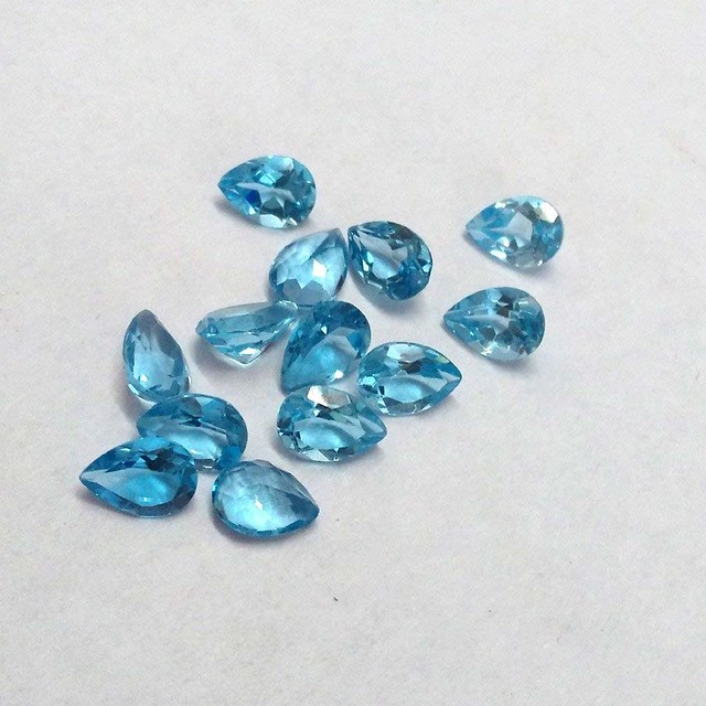 natural swiss blue toapz pear faceted gemstone