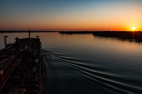 canada laurentiadesgagnes quebec stlawrenceriver sunset water calm ship shoreline tanker