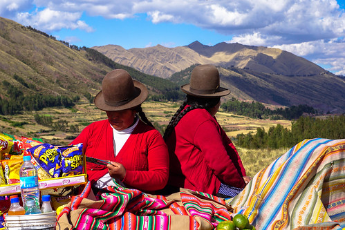 travel peru andes cusco mountains mountainside landscape sky cloud tree people