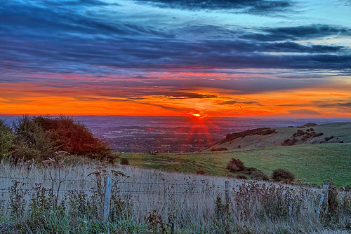 Sunrise by Croydon Clicker, The sun just peeps over the horizon this morning at Ditchling Beacon, East Sussex, UK.dawn sunrise d