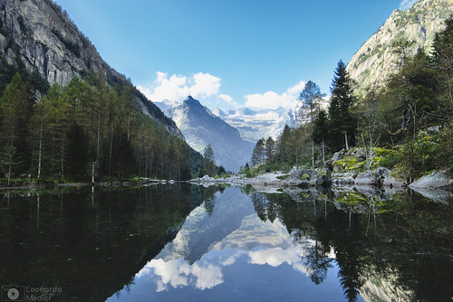 alps mountains mountain mountainpeak blue lake mountainlake mirror reflections reflection water river idyllic valley panorama landscape sky clouds cloud green forest trees tree travel outdoor hike noperson italy lombardy valtellina valdimello