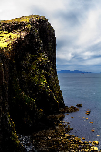 scotland isleofskye cliff sea outdoor landscape grass rock water sky