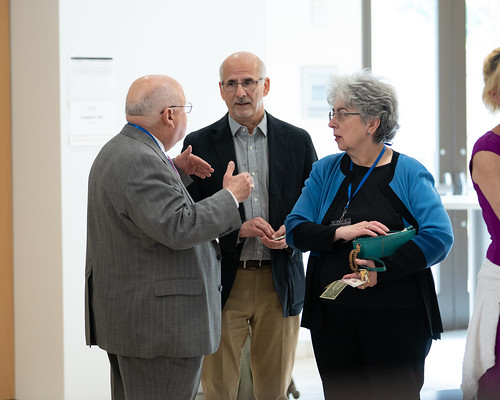 Prof. Fred Parrella, Prof. Bill Dohar, and Marie Bernard